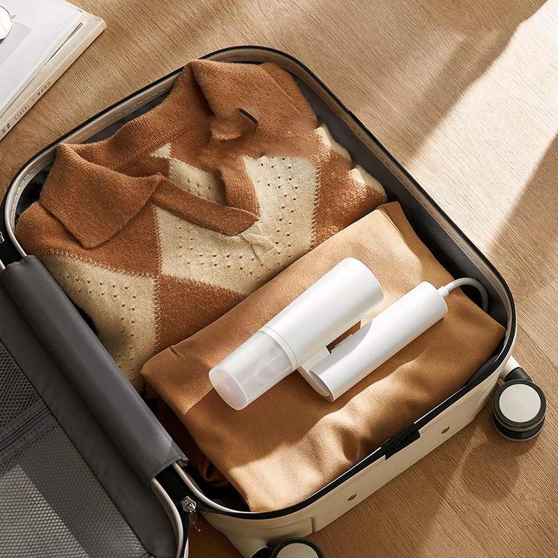 เครื่องรีดผ้าไอน้ำแบบมือถือ Xi - Mini Iron Travel บทวิจารณ์และราคา